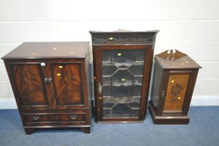 A FLAME MAHOGANY MEDIA CABINET, with two doors over a fall front door, width 71cm x depth 45cm x