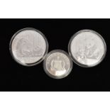 THREE SILVER COINS, to include two 1oz Ag .999 Chinese Panda coins, both in protective capsules,
