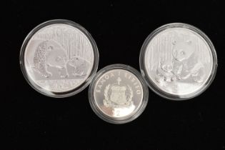 THREE SILVER COINS, to include two 1oz Ag .999 Chinese Panda coins, both in protective capsules,