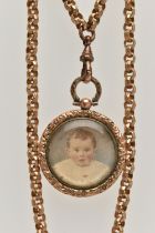 A GOLD PLATED LONGUARD CHAIIN AND PHOTO LOCKET, gold plated textured belcher chain, fitted with a