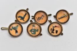 SIX 'GUINESS' SHIRT STUDS, loose studs, each depicting a different image, each signed 'Guiness'