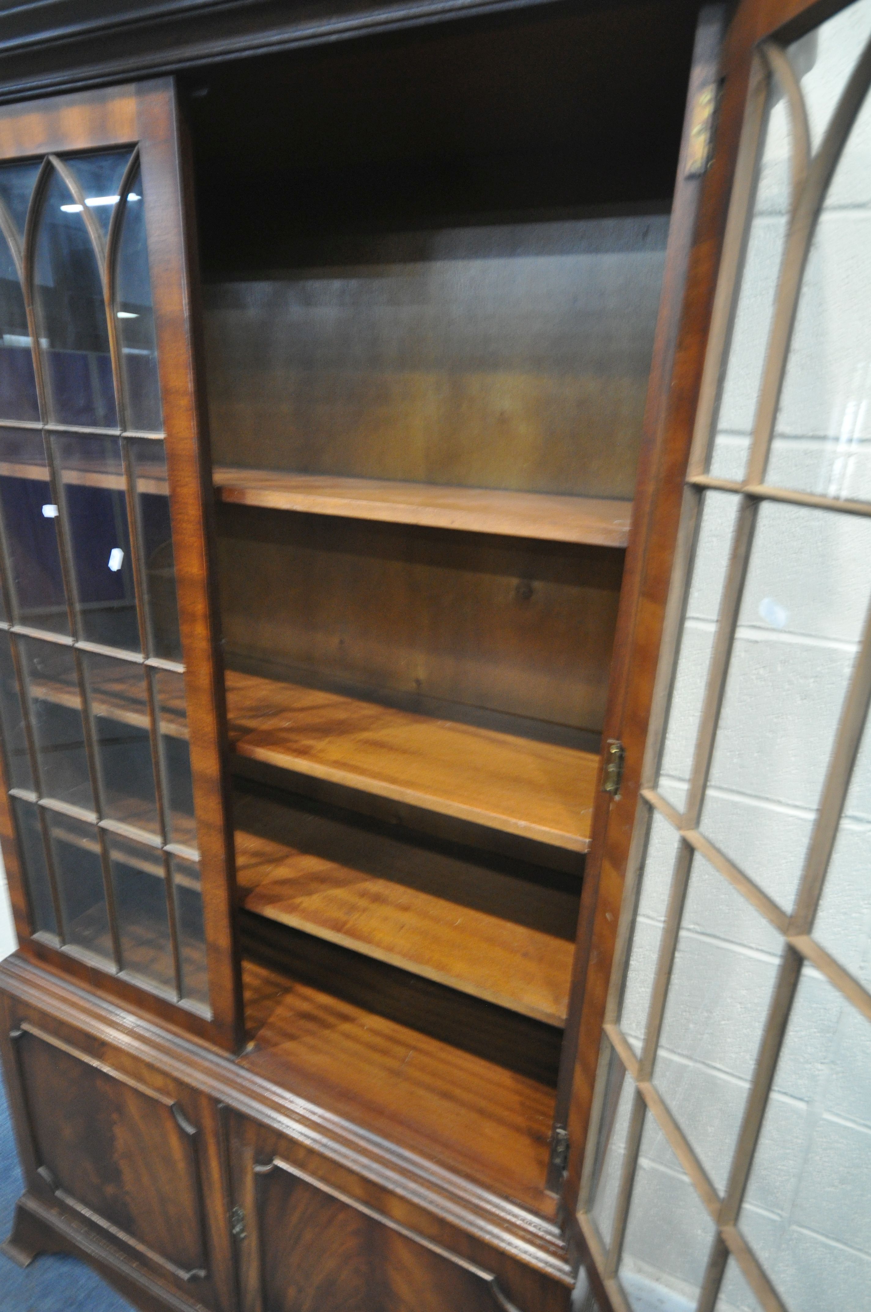 A BEVAN FUNNELL MAHOGANY BOOKCASE, with two glazed doors and two cupboard doors, width 106cm x depth - Image 3 of 5