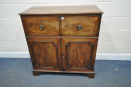 A GEORGIAN MAHOGANY SECRETAIRE CUPBOARD, the top drawer with a fall front enclosing a fitted