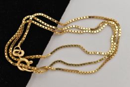 A YELLOW METAL CHAIN NECKLACE, fine box link chain, fitted with a spring clasp, approximate length