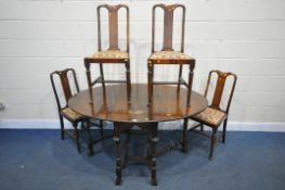 A 20TH CENTURY MAHOGANY OVAL GATE LEG TABLE, with turned and tapered legs, on shaped feet, united by