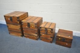 A SET OF THREE GRADUATED MANGO WOOD AND IRON BANDED STORAGE CHESTS, width 46cm x depth 46cm x height