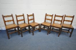 A SET OF SIX 19TH CENTURY AND LATER WELSH ELM FARMHOUSE CHAIRS, with shaped back rests, on block