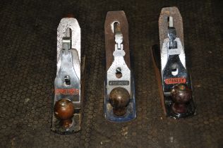 A STANLEY BAILEY NUMBER 4 PLANE, a Whitmore number 4 plane, and a Silverline number 4 plane (