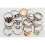 A BAG WHITE METAL RINGS, to include a silver citrine ring, hallmarked London import, twelve white