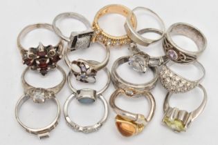 A BAG WHITE METAL RINGS, to include a silver citrine ring, hallmarked London import, twelve white