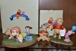 THREE DISNEY 'POOH & FRIENDS' FIGURES, comprising a boxed 'A Petal For Your Thoughts' figure