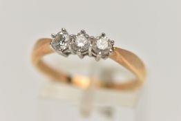 AN 18CT GOLD DIAMOND THREE STONE RING, set with three round brilliant cut diamonds, estimated