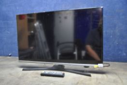 A SAMSUNG UE32J5100AK 32 INCH TV, with remote (condition report: PAT pass and working)