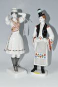 TWO HOLLOHAZA PORCELAIN FIGURES, the Hungarian figures of a young man and woman in traditional