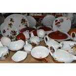 A COLLECTION OF MIDWINTER POTTERY DINNERWARES, over fifty pieces in Cornfield, Shadow Rose and