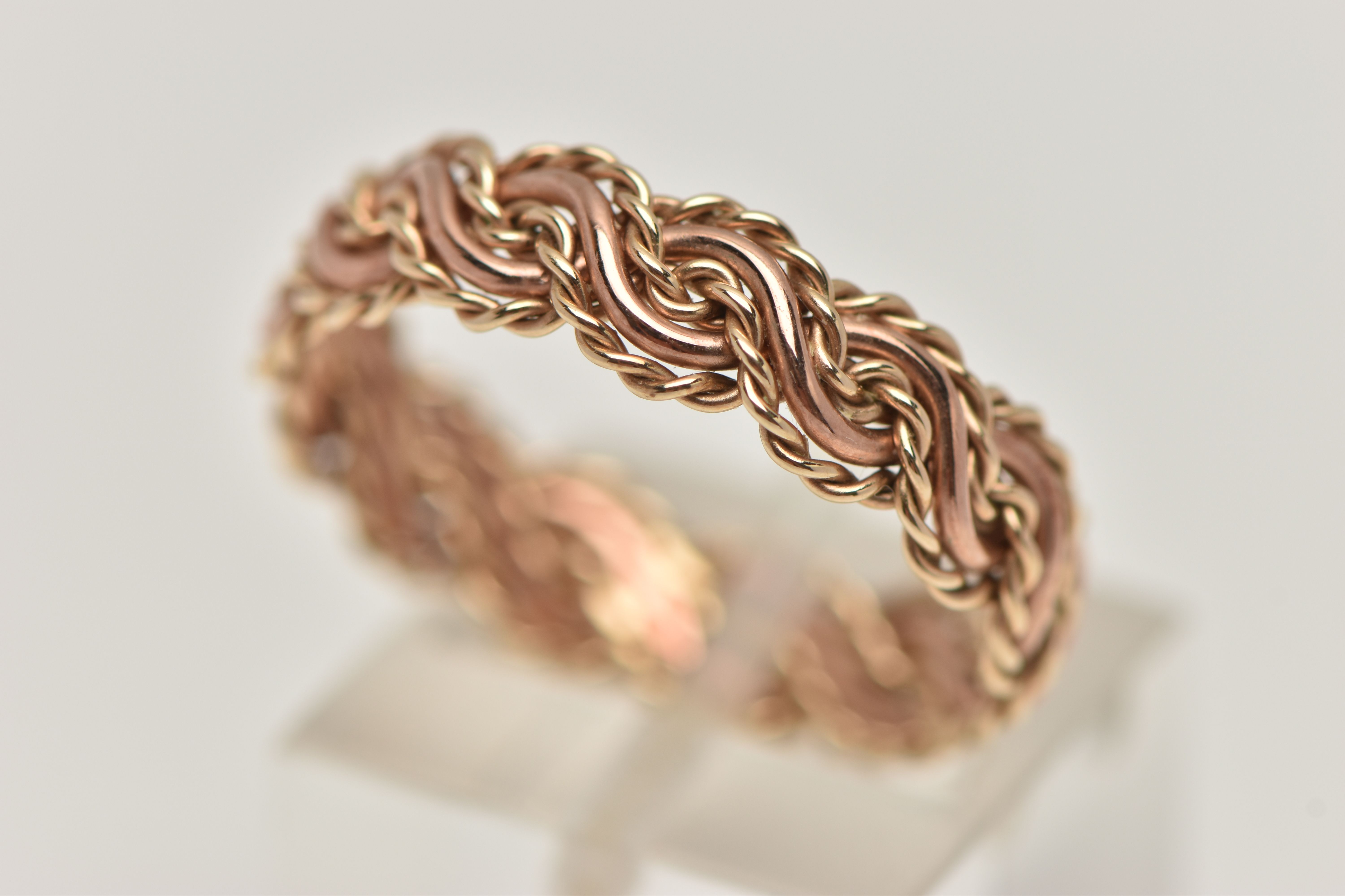 A 9CT ROSE GOLD 'CLOGAU' RING, textured band design, hallmarked 9ct Edinburgh, ring size Q 1/2