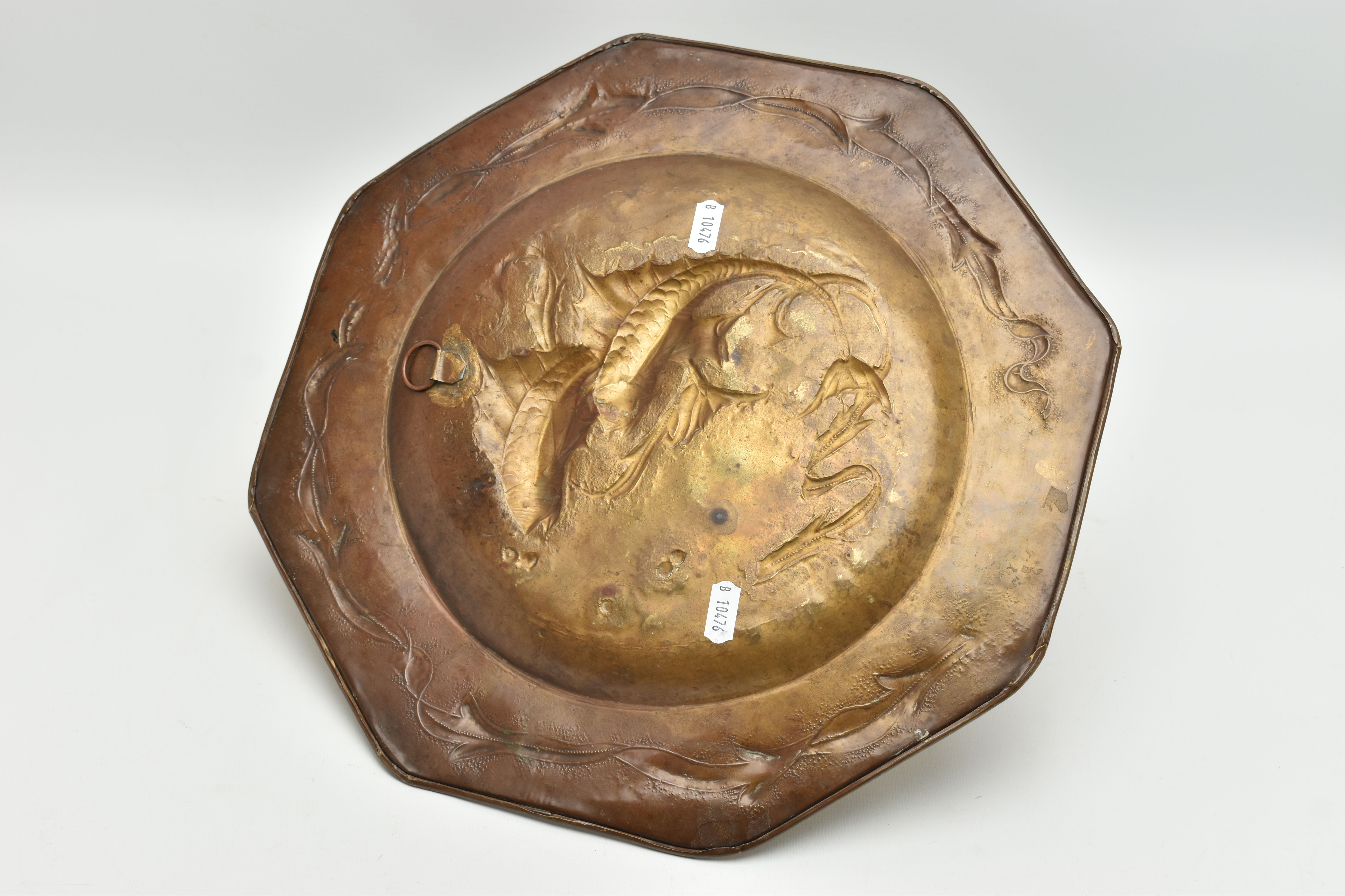 MANNER OF JOHN PEARSON, AN OCTAGONAL ARTS & CRAFTS BRASS CHARGER, embossed with two fish to the - Image 4 of 7