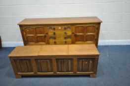 AN OAK SIDEBOARD, with four central drawers, width 170cm x depth 45cm x height 78cm, along with a