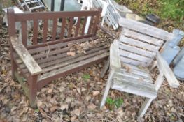 A WOODEN SLATTED GARDEN BENCH width 128cm and a wooden slatted garden chair (2)