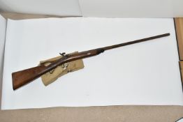 AN ANTIQUE 11 BORE SINGLE BARREL PERCUSSION SHOTGUN FITTED WITH A HIGH QUALITY DAMASCUS 31'' BARREL,