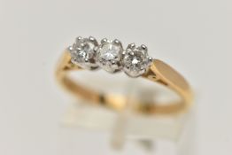 AN 18CT GOLD DIAMOND THREE STONE RING, set with three round brilliant cut diamonds, estimated