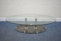 AN OVAL GLASS COFFEE TABLE, length 136cm x depth 65cm (condition report: in need of a clean)