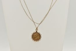 A HALF SOVEREIGN PENDANT AND CHAIN, half sovereign depicting Edward VII, dated 1908, in a collet
