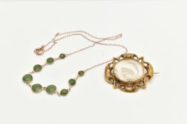 A YELLOW METAL NEPHRITE PENDANT NECKLACE AND A MOURNING BROOCH, the necklace designed with nine