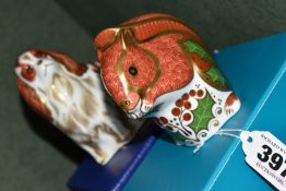 TWO BOXED ROYAL CROWN DERBY PAPERWEIGHTS, comprising Christmas Squirrel and Cavalier King Charles