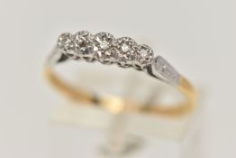 A YELLOW METAL FIVE STONE DIAMOND RING, set with five graduated single cut diamonds, each in a white