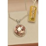 A SILVER 'CLOGAU' PENDANT NECKLACE, the circular two tone floral pendant, signed 'Clogau', fitted