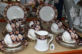 A ROYAL ALBERT 'HEIRLOOM' PATTERN PART TEA SET, comprising twelve cups, saucers and side plates, a