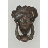 A LATE VICTORIAN NEO-CLASSICAL STYLE BRONZE DOOR KNOCKER IN THE FORM OF A FEMALE MASK, height