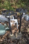 A PAIR OF TALL METAL AND STONE PLANT POT HOLDERS STANDS, with wrought iron baskets and composite