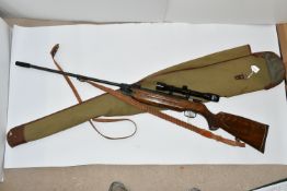 A .22'' WEIHRAUCH MODEL HW35 AIR RIFLE, made in Germany serial number 660057, it appears to have had