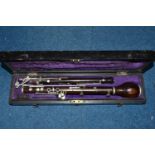 A CASED NINETEENTH CENTURY TRIEBERT ROSEWOOD OBOE, stamped 'Brevete, Triebert a Paris, 582', in a