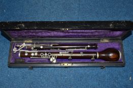 A CASED NINETEENTH CENTURY TRIEBERT ROSEWOOD OBOE, stamped 'Brevete, Triebert a Paris, 582', in a