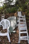 FIVE ALUMINIUM STEP LADDERS, two steel step ladder, a green plastic garden table and a white plastic
