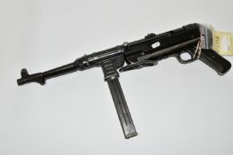 A WWII GERMAN 9MM MP40 SCHMEISSER SUB MACHINE GUN, marked byf, signifying production by Erma, serial