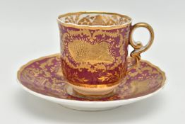 AN EARLY 19TH CENTURY SPODE PEMBROKE SHAPE COFFEE CUP AND SAUCER, pattern no.4525, the claret ground