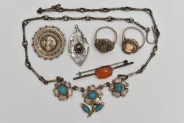 AN ASSORTMENT OF WHITE METAL JEWELLERY, to include a late 19th century AF brooch, an early 20th
