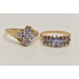 TWO 9CT GOLD GEM SET RINGS, the first set with a row of marquise cut tanzanite, to a polished