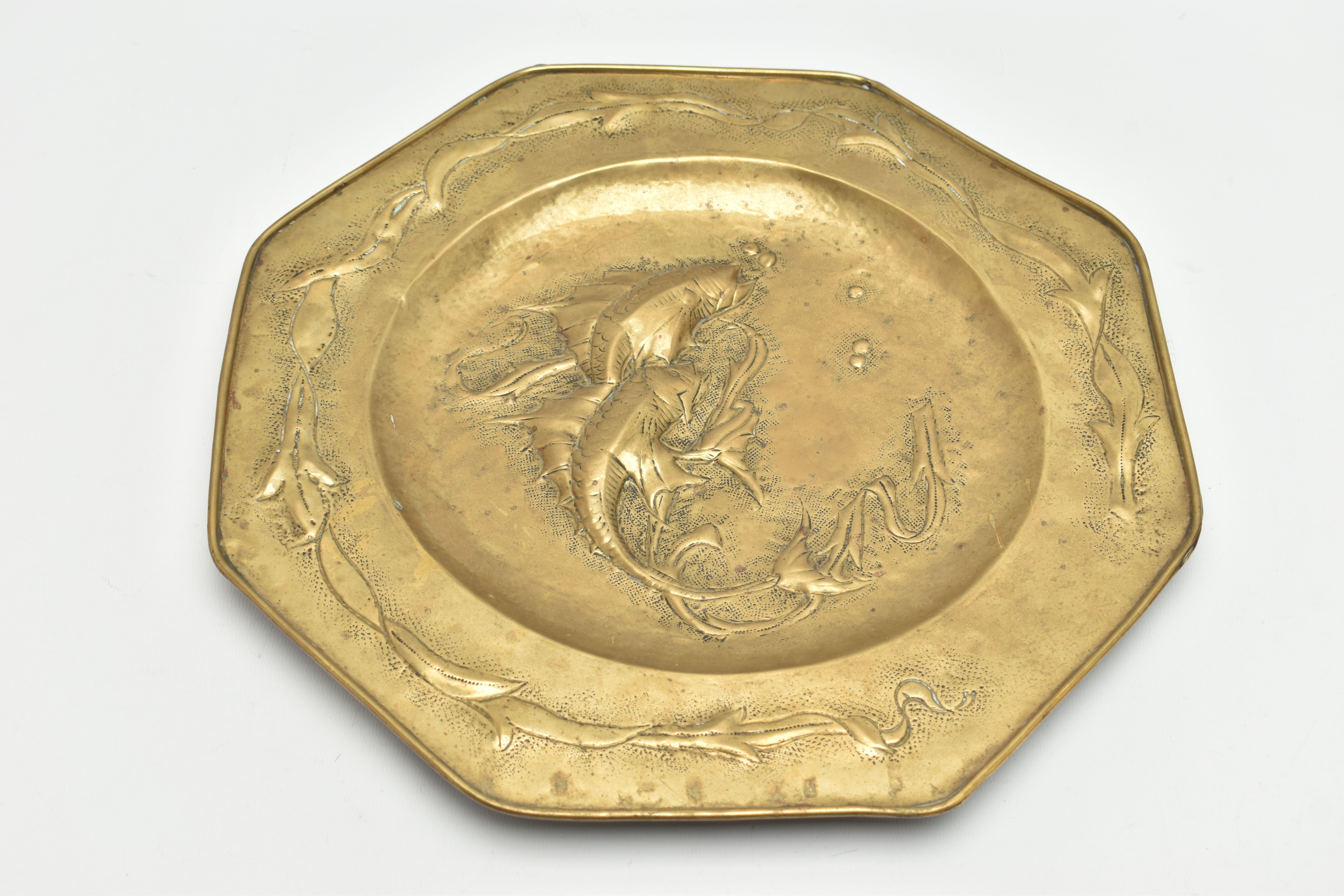 MANNER OF JOHN PEARSON, AN OCTAGONAL ARTS & CRAFTS BRASS CHARGER, embossed with two fish to the - Image 6 of 7