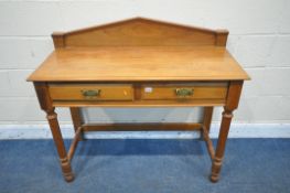 AN EDWARDIAN MAHOGANY SIDE TABLE, with a raised back, two frieze drawers, on turned front legs,