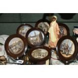 A ROYAL DOULTON 'IBRAHIM' FIGURE AND SEVEN FRAMED PRATTWARE POT LIDS, comprising Royal Doulton