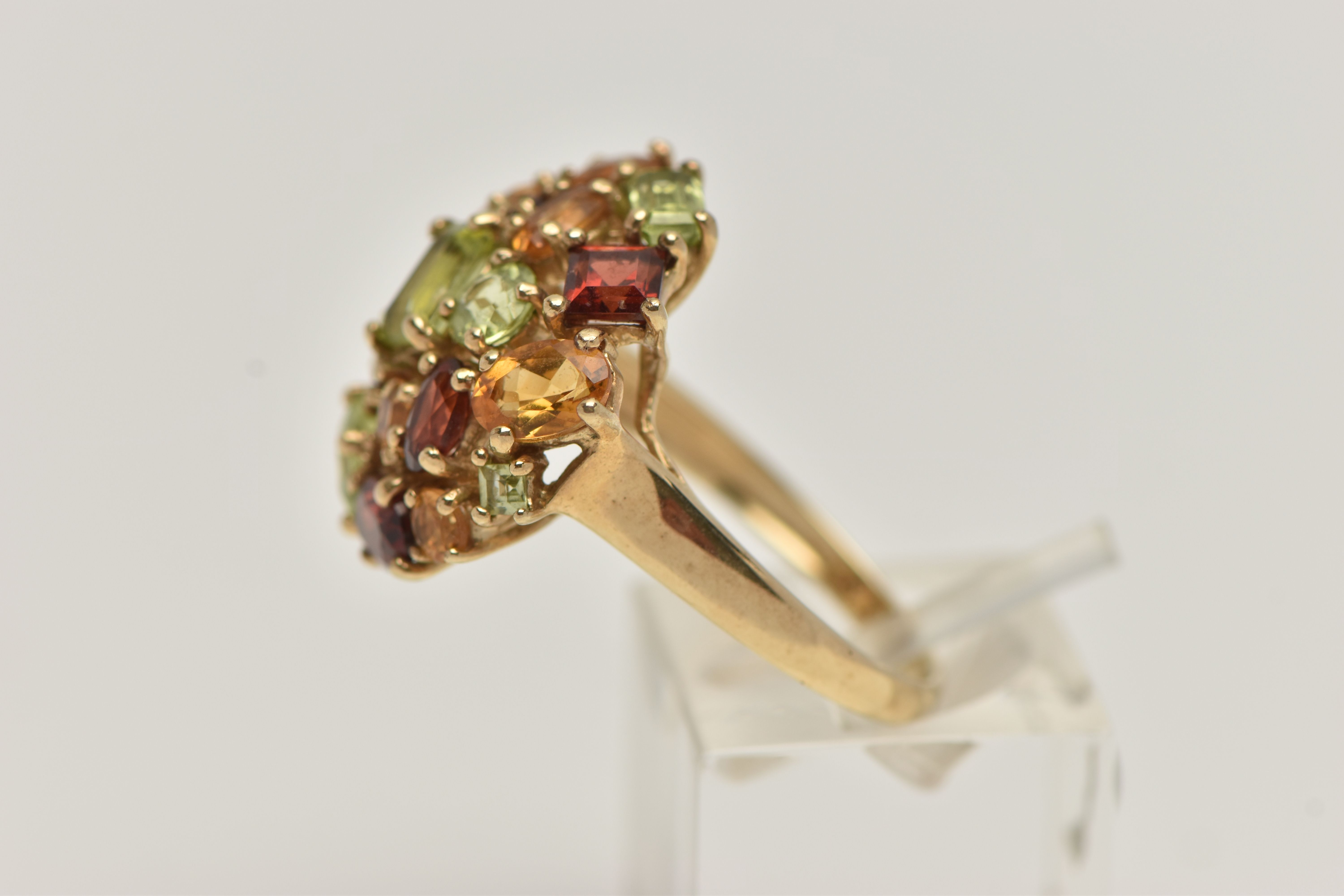 A 9CT GOLD GEM SET CLUSTER RING, large statement cluster, set with vary cut stones such as - Image 2 of 4