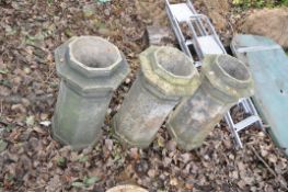 A SET OF THREE VINTAGE CHIMNEY POTS all embossed Farnley and Co heights 75cm