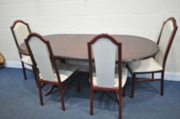 A MODERN MAHOGANY EXTENDING DINING TABLE, with a single fold out leaf, open length 193cm x closed