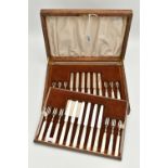 A MID 20TH CENTURY CANTEEN OF DESSERT KNIVES AND FORKS, twelve person table setting, silver blades