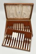 A MID 20TH CENTURY CANTEEN OF DESSERT KNIVES AND FORKS, twelve person table setting, silver blades